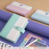Sổ da simili size A6 đóng còng thiết kế hai màu - SBC 111